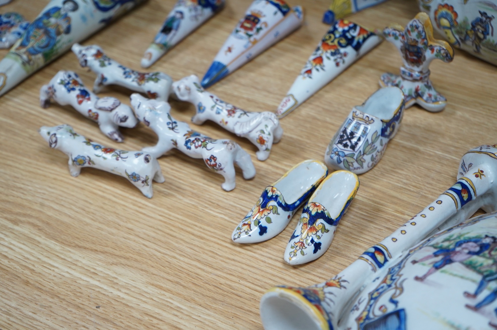 19th century French decorative faience including bag pipes, a large wall pocket, jardiniere etc (22).